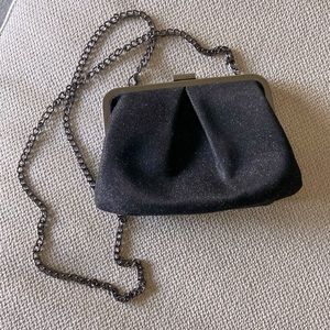Black special occasion handbag with a bit of sparkle and long shoulder chain